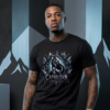 Athletic male model with tattoos standing against an angular, abstract mountain backdrop wearing a premium black graphic streetwear t-shirt featuring a detailed Capricorn goat-warrior design by Essentia Collective.
