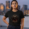 Aries Ram Graphic Streetwear Black T-Shirt Female model on a rooftop overlook wearing a premium black graphic streetwear t-shirt featuring a detailed Aries ram head and dark horn crown design by Essentia Collective.