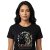 Female model with long straight hair modeling a premium black graphic streetwear t-shirt featuring a detailed Gemini dual-warrior design by Essentia Collective..