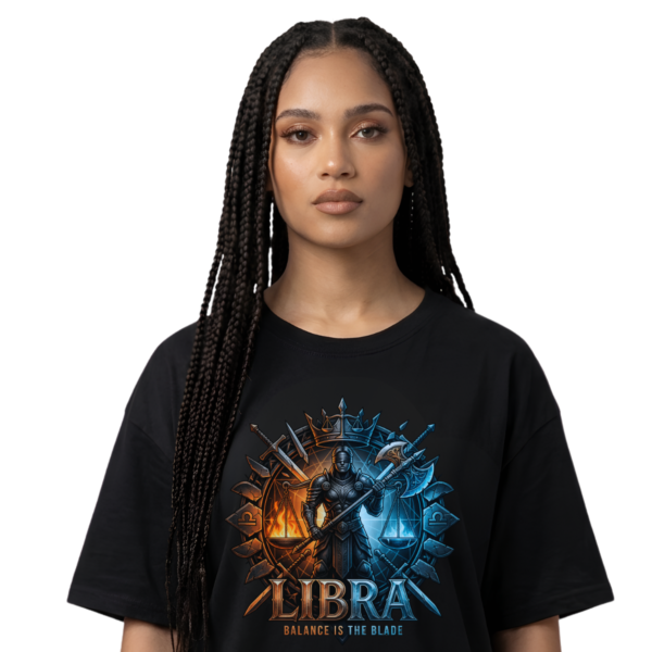Female model wearing a premium black graphic streetwear t-shirt featuring a detailed Libra knight, scales of justice, and blades design by Essentia Collective.