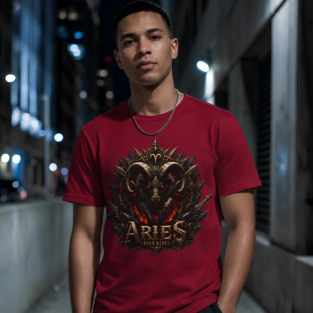 Male model wearing a premium cardinal red graphic streetwear t-shirt featuring a detailed Aries crown and crossed axes design by Essentia Collective.
