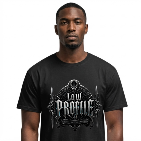 Low Profile Gothic Graphic Black Streetwear T-Shirt male model looking directly forward against an isolated plain white background, wearing a premium black graphic streetwear t-shirt featuring a highly detailed silver and iron Low Profile chest design.