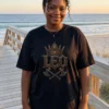 Model wearing Leo Crown Energy black gothic streetwear T-shirt