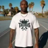 Model wearing white Taurus Stand Your Ground T-Shirt front gothic zodiac design