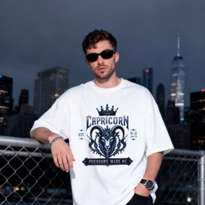 Capricorn Pressure model wearing white Made Me gothic crest T-shirt