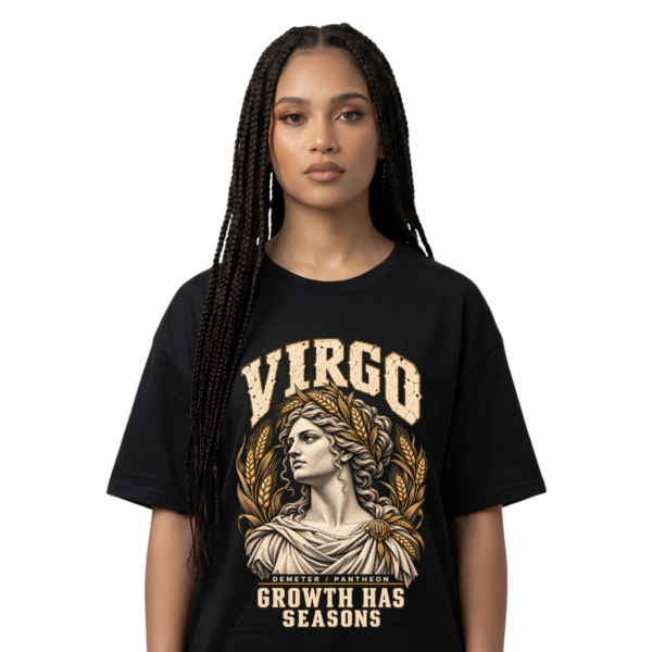 Female model wearing a black Virgo zodiac graphic T-shirt featuring gold-toned Demeter-inspired artwork.