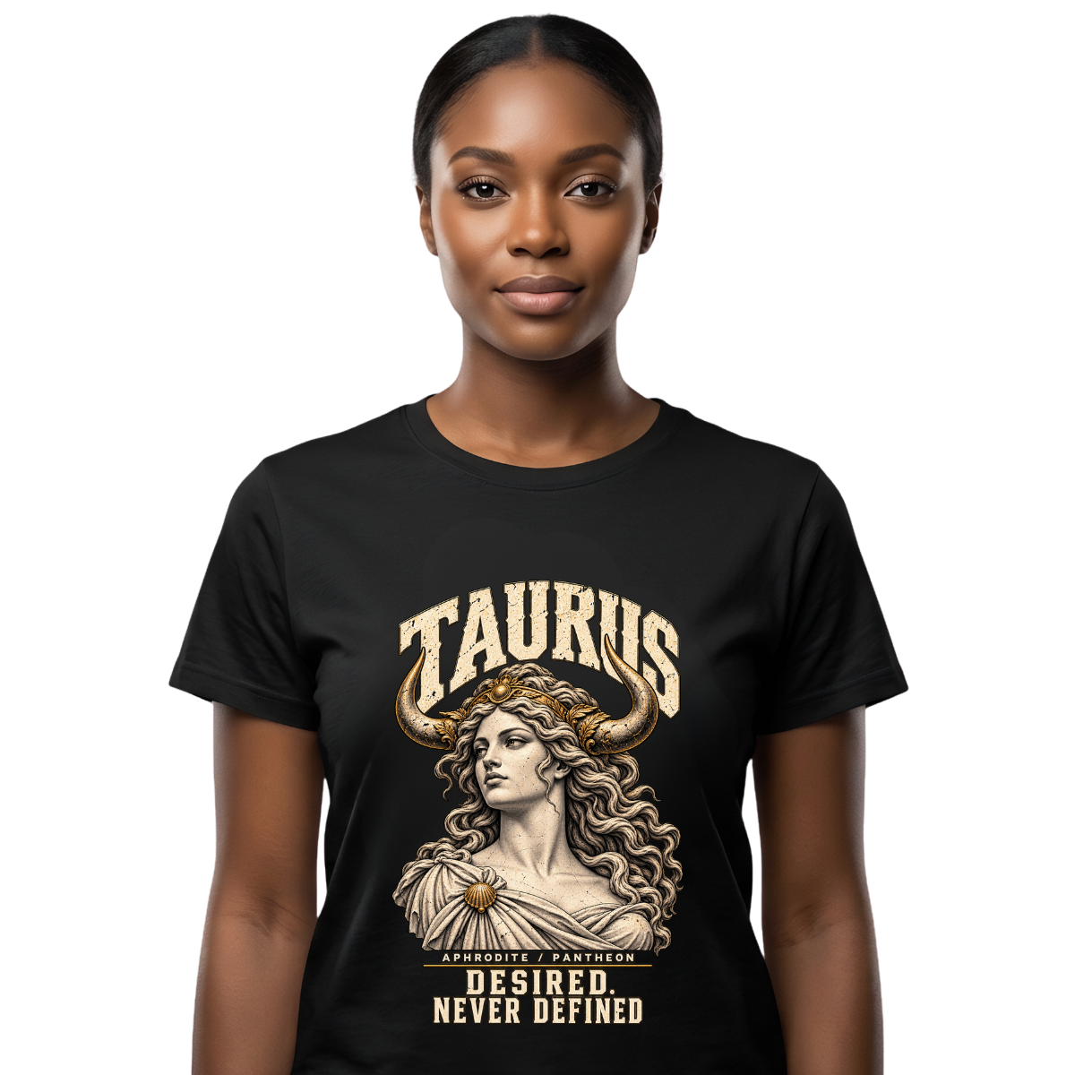 Female model wearing a black Taurus zodiac graphic T-shirt featuring gold-toned Aphrodite-inspired artwork.