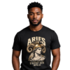 Male model wearing a black Aries zodiac graphic T-shirt featuring gold-toned Athena-inspired mythology artwork.