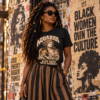 Aquarius-keep faith with yourself lifestyle Female model wearing a black Aquarius zodiac graphic T-shirt and brown skirt against an urban mural wall.